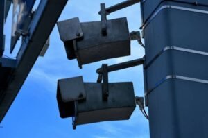 Steel mast poles used in public transport systems for lighting, cameras, and signal equipment