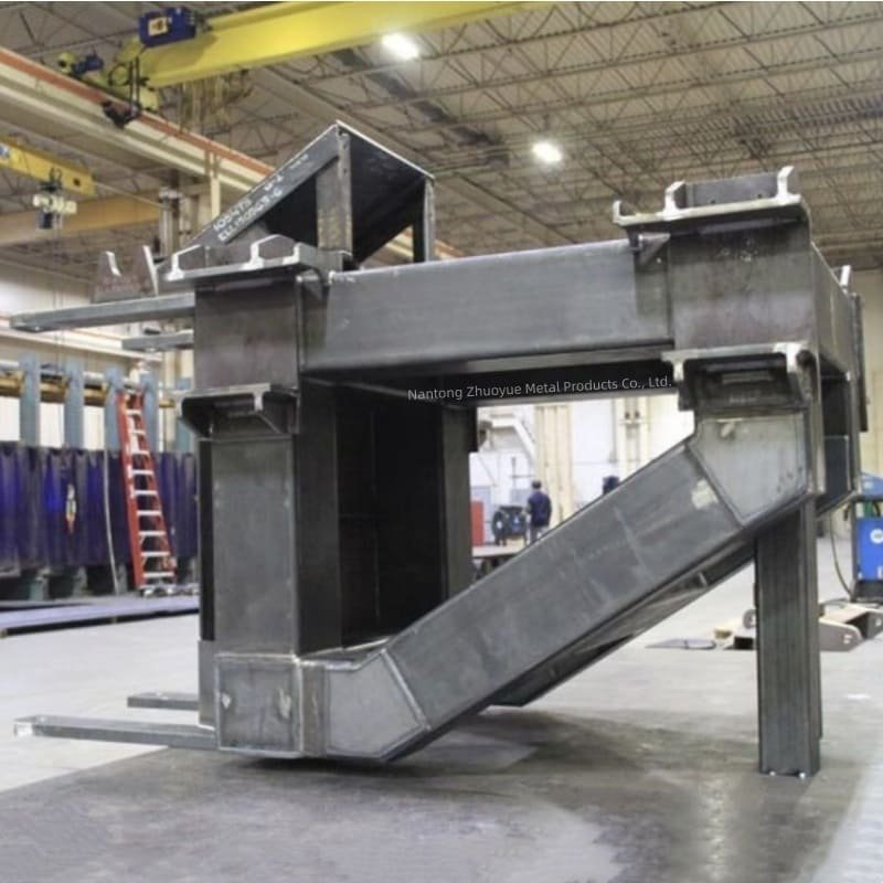 Welded steel assembly fabricated with precision welding for trailer chassis and industrial applications