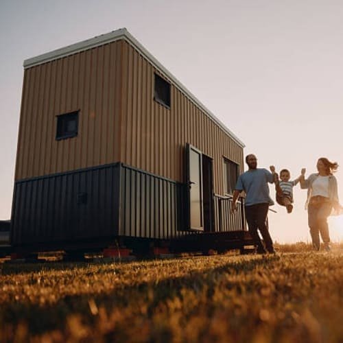 Towable tiny house on wheels with a custom steel chassis frame